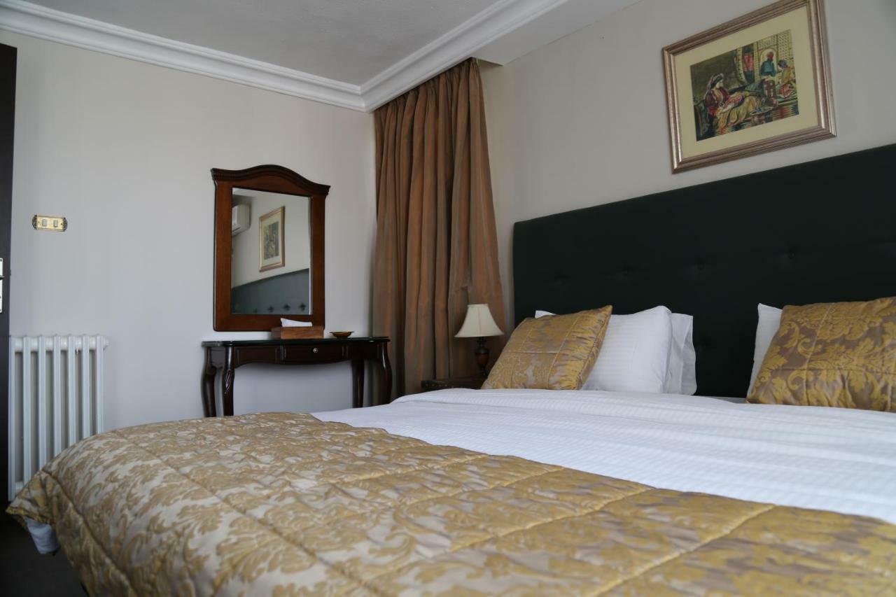 Gondola Hotel & Suites Аман Екстериор снимка